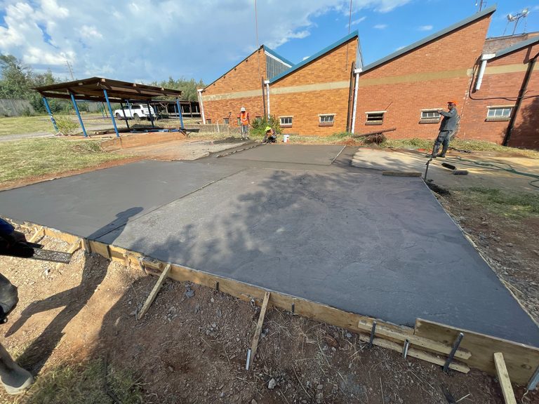 Reinforced concrete plinth at industrial site